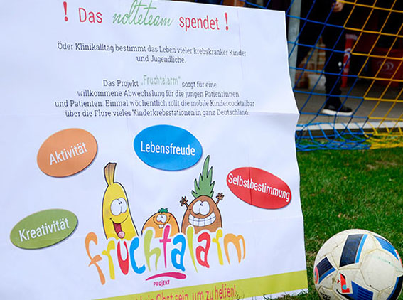 Spendenplakat: Das nolteteam spendet für die Aktion Fruchtalarm zugunsten krebskranker Kinder